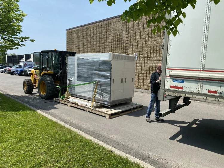 Used Stratasys Fortus 900mc / F900 being unloaded