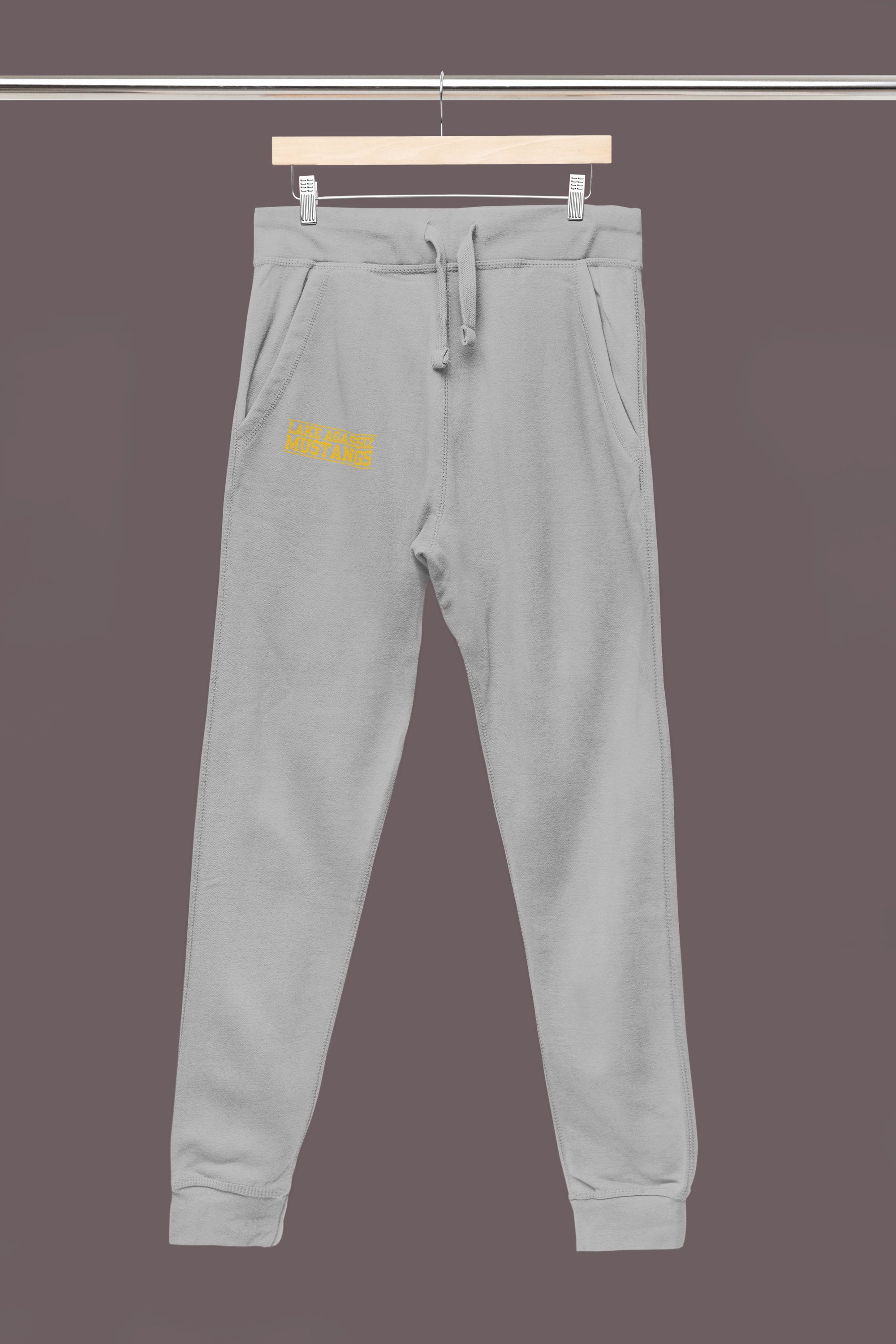 mockup-of-a-pair-of-sweatpants-hanging-from-a-steel-m33404.png