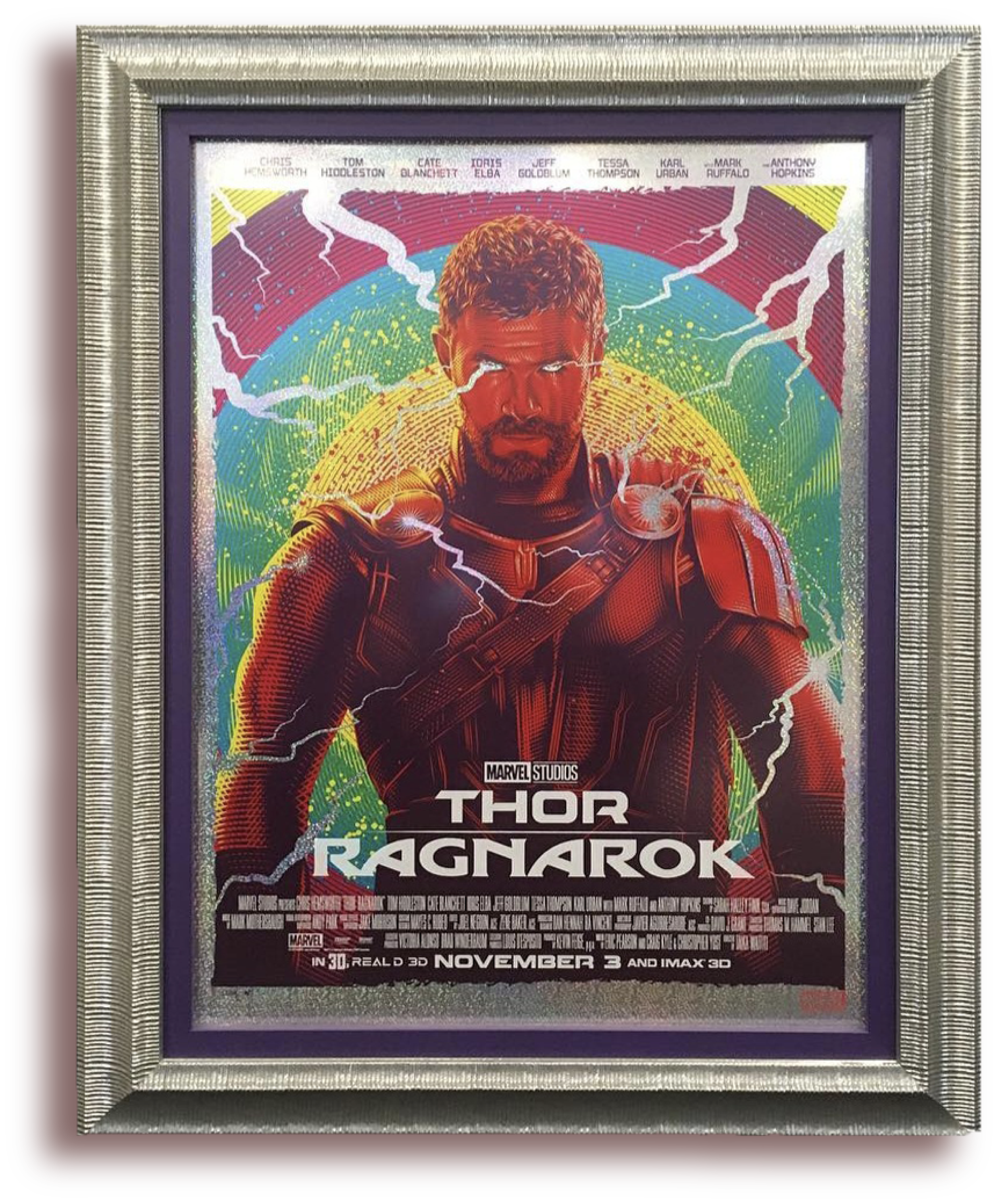 Framed poster of Marvel's Thor: Ragnarok featuring Thor with lightning bolts behind him, with the title and release date at the bottom.