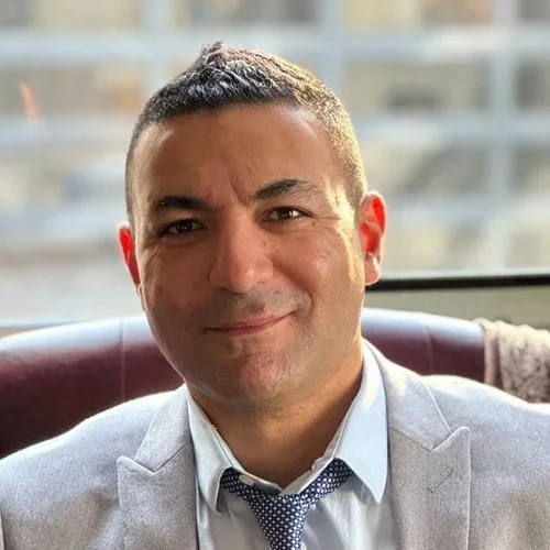 Headshot of Ahmed Rehab, All United Board Member