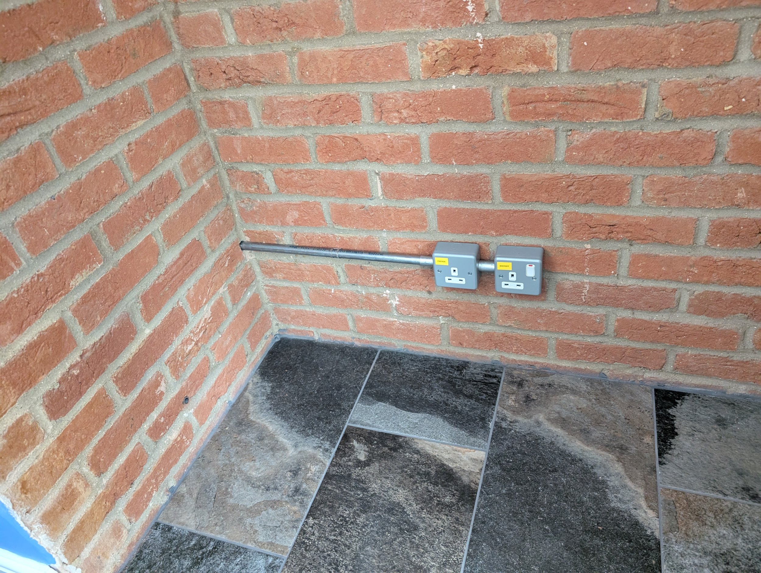 Steel conduit with MK sockets installed in Oxford
