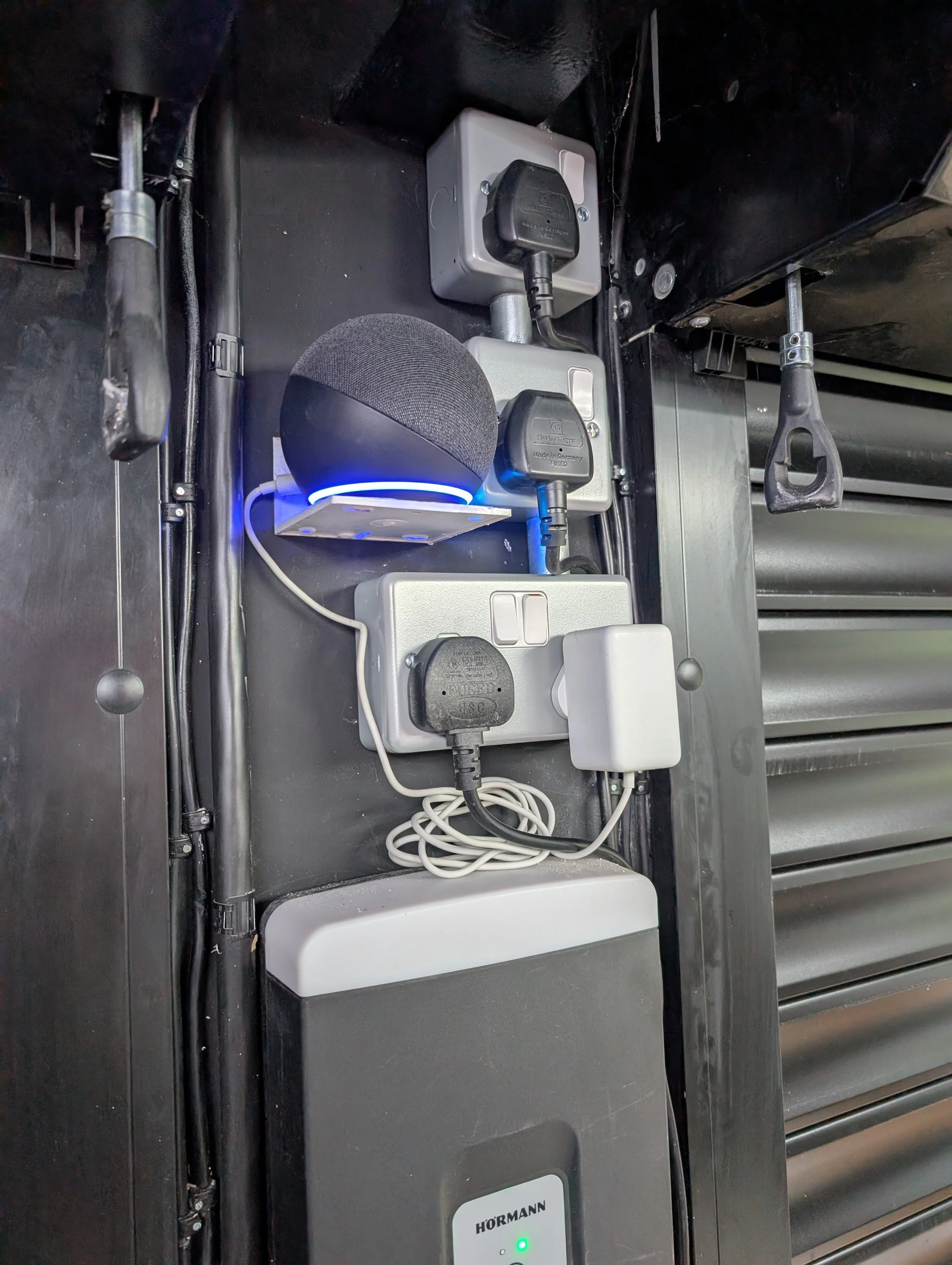 Surface power installation for garage doors, and handy shelf for Alexa!
