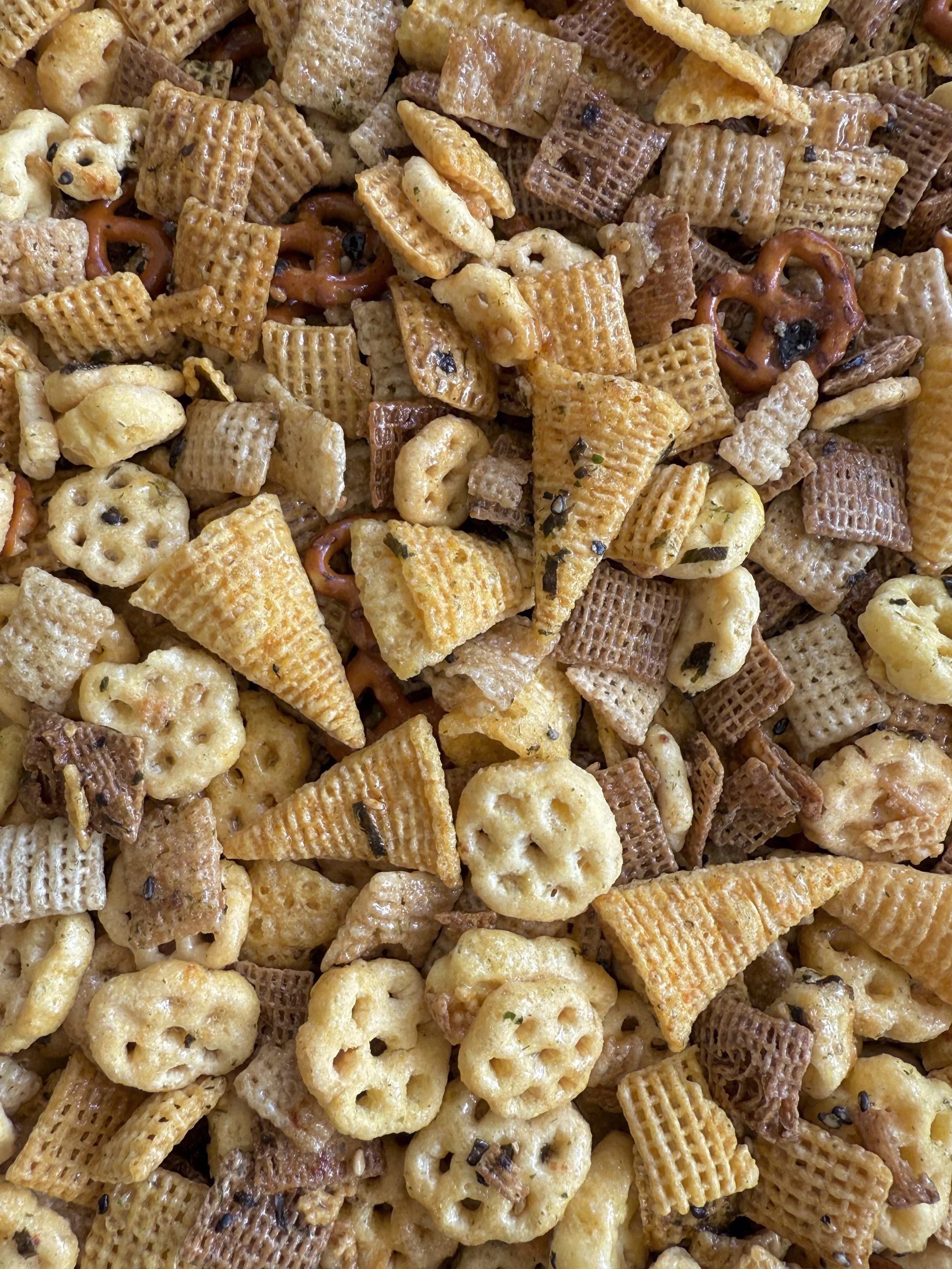 Close up shot of our Hawaiian Chex Mix made with Bugles, Honeycomb Cereal, Chex, & More!