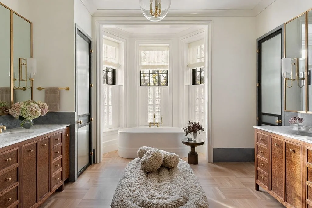 Repose / clients want relaxing and restful bathroom spaces. The main bath of this Lincoln Park Renovation/Restoration creates a room for bathing, lounging, and taking care. Burled walnut cabinetry, a parquet floor, and marble details create a space i