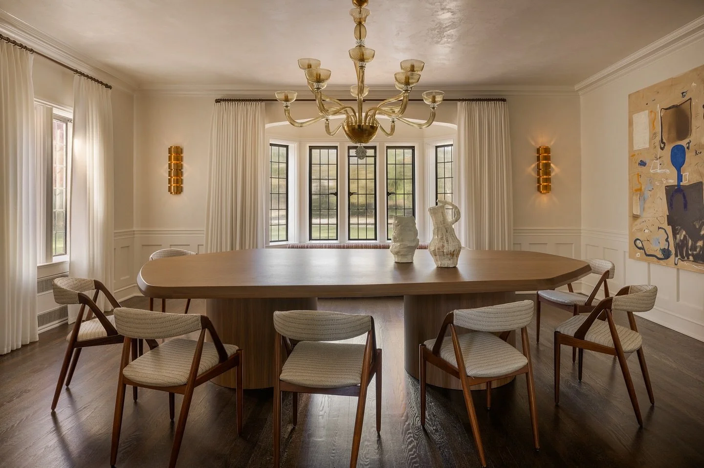 Tudor Bones / This 1920s Tudor Revival home had amazing bones but a few tweaks and updates really helped make the spaces sing and work for the next 100 years. In this grand dining room, a Tudor arch was added to the front bay window along with a wind
