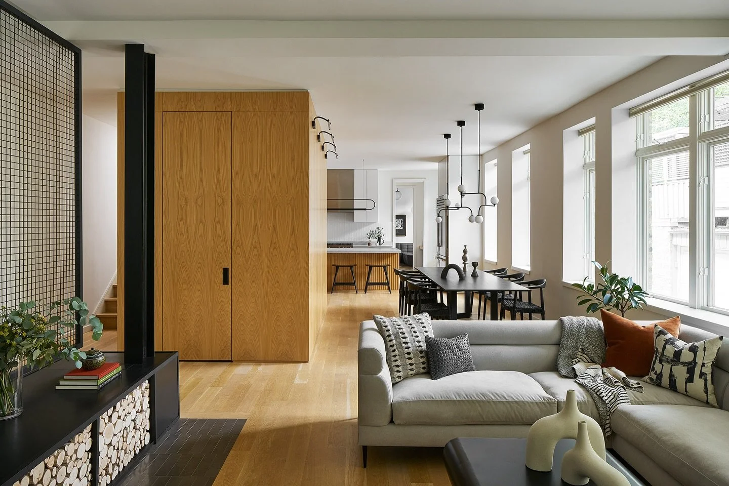 Simplicity / With incredible light from a wall of windows this formerly industrial building was converted into a warm but minimal space using a limited palette of materials&mdash;white oak, warm white, and black metal. #designenmasse 📸 @rymcdon