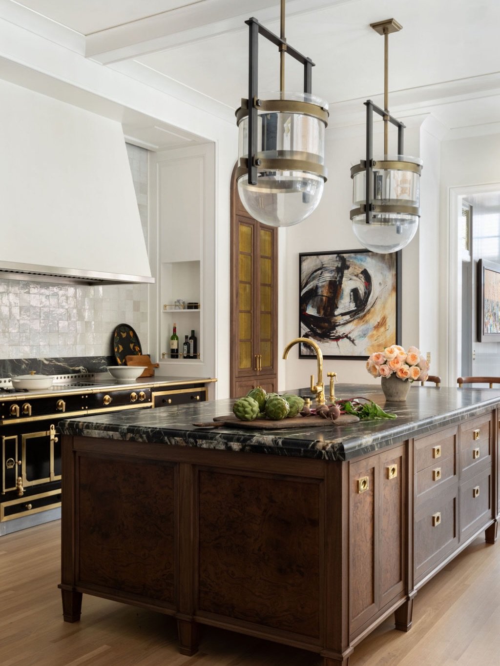Heirloom Quality / The materials and details of this Lincoln Park kitchen were designed to stand the test of time. Cabinets were designed inside and out to be beautiful, sturdy, and tailor made for our client. Walnut, plaster, quartzite, zellige tile