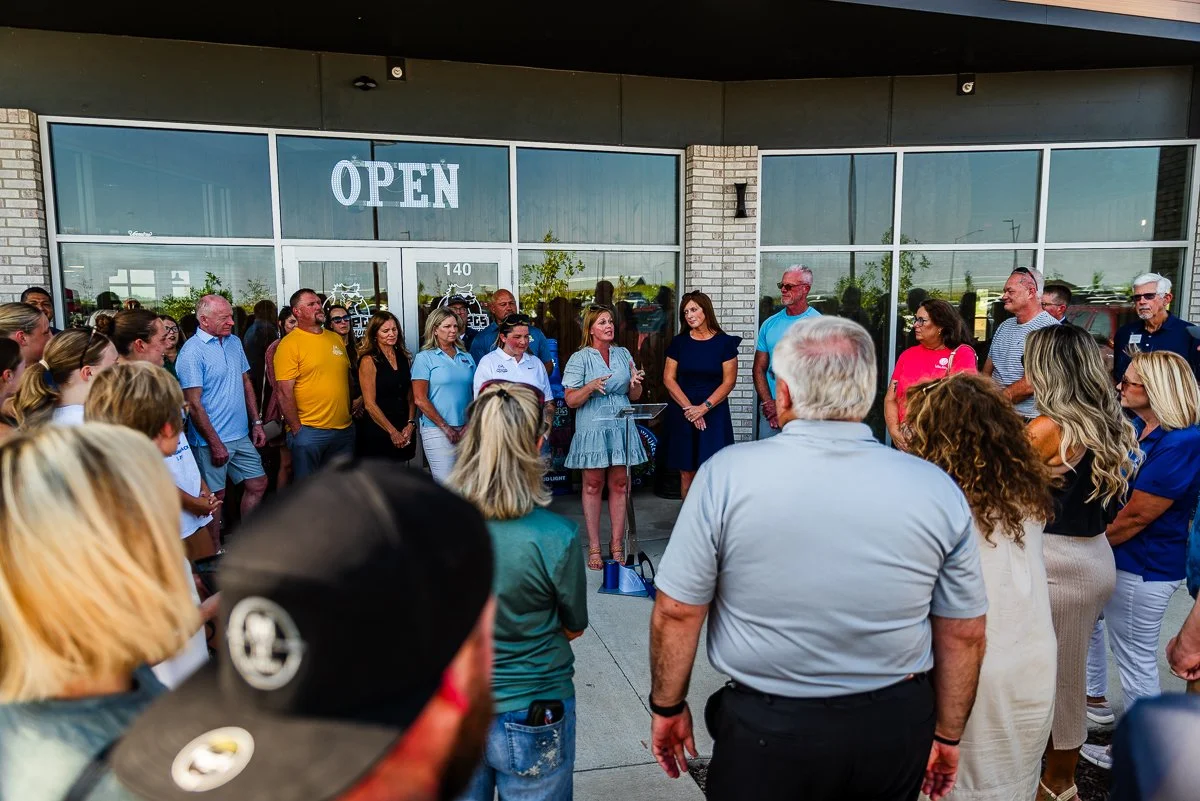 Waukee Chamber of Commerce speaking at Mullets Waukee Ribbon Cutting