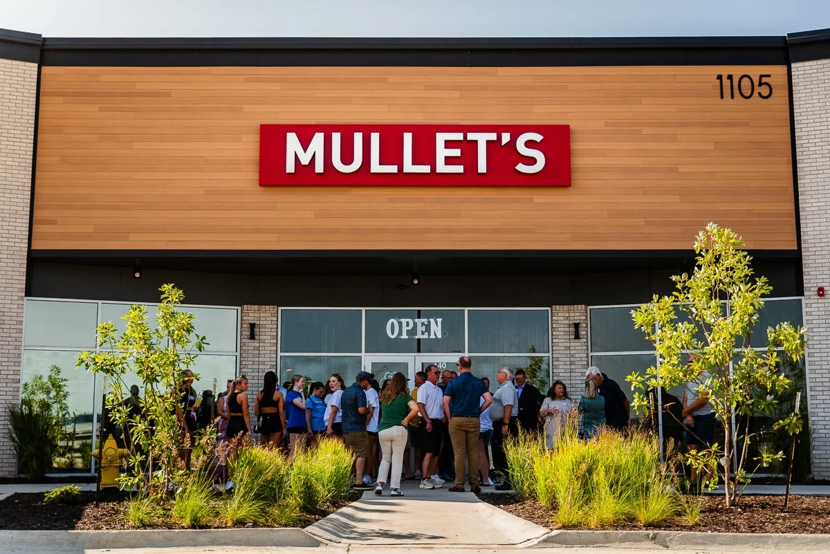 Why Event Photography Matters: Mullets Waukee's Ribbon Cutting