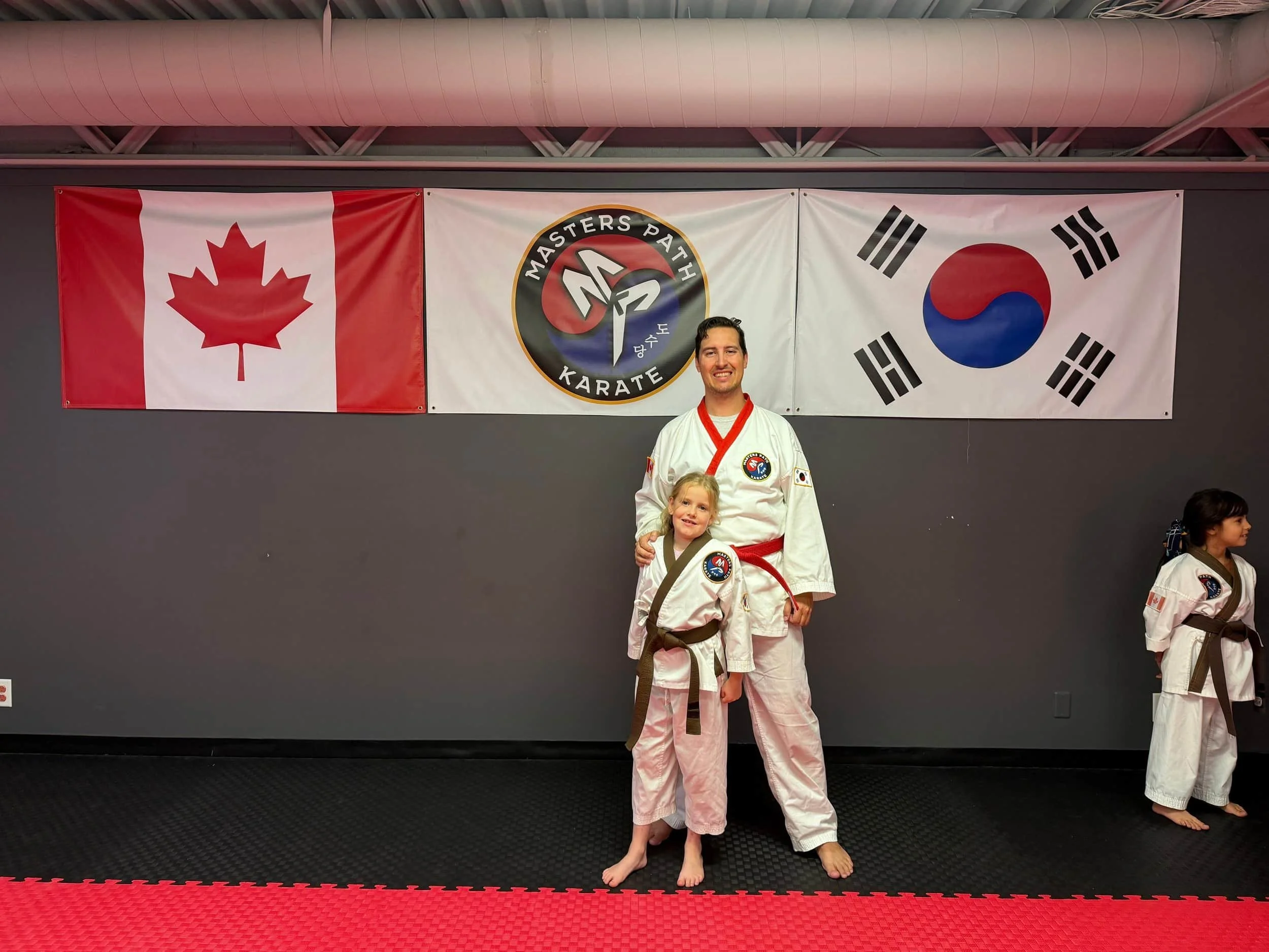 Masters Path Karate Students a man and his daughter training together