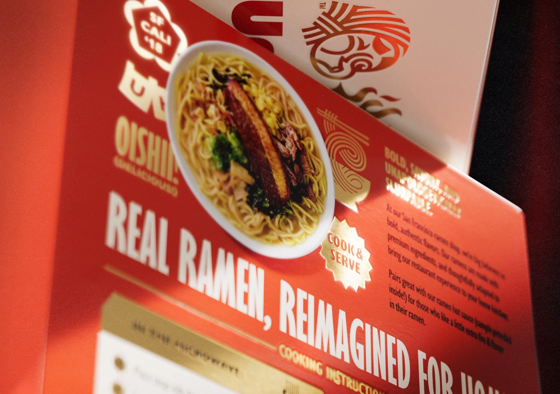 A close up view of the back of the Umami Hottie ramen boxes showing a bowl of cooked ramen and foil graphics