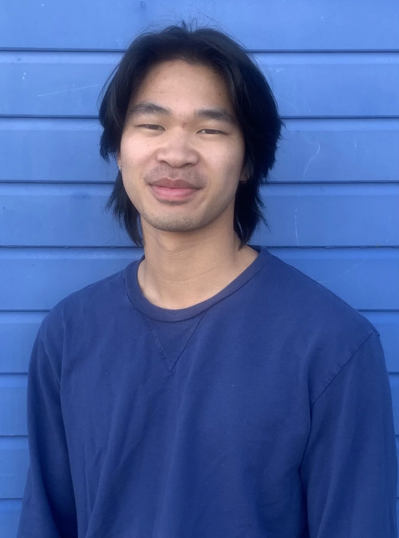 Santa Monica Traze logo featuring a silhouette of a whale jumping over waves with sun rays, columns, and text reading 'Santa Monica Traze Populus Felix'