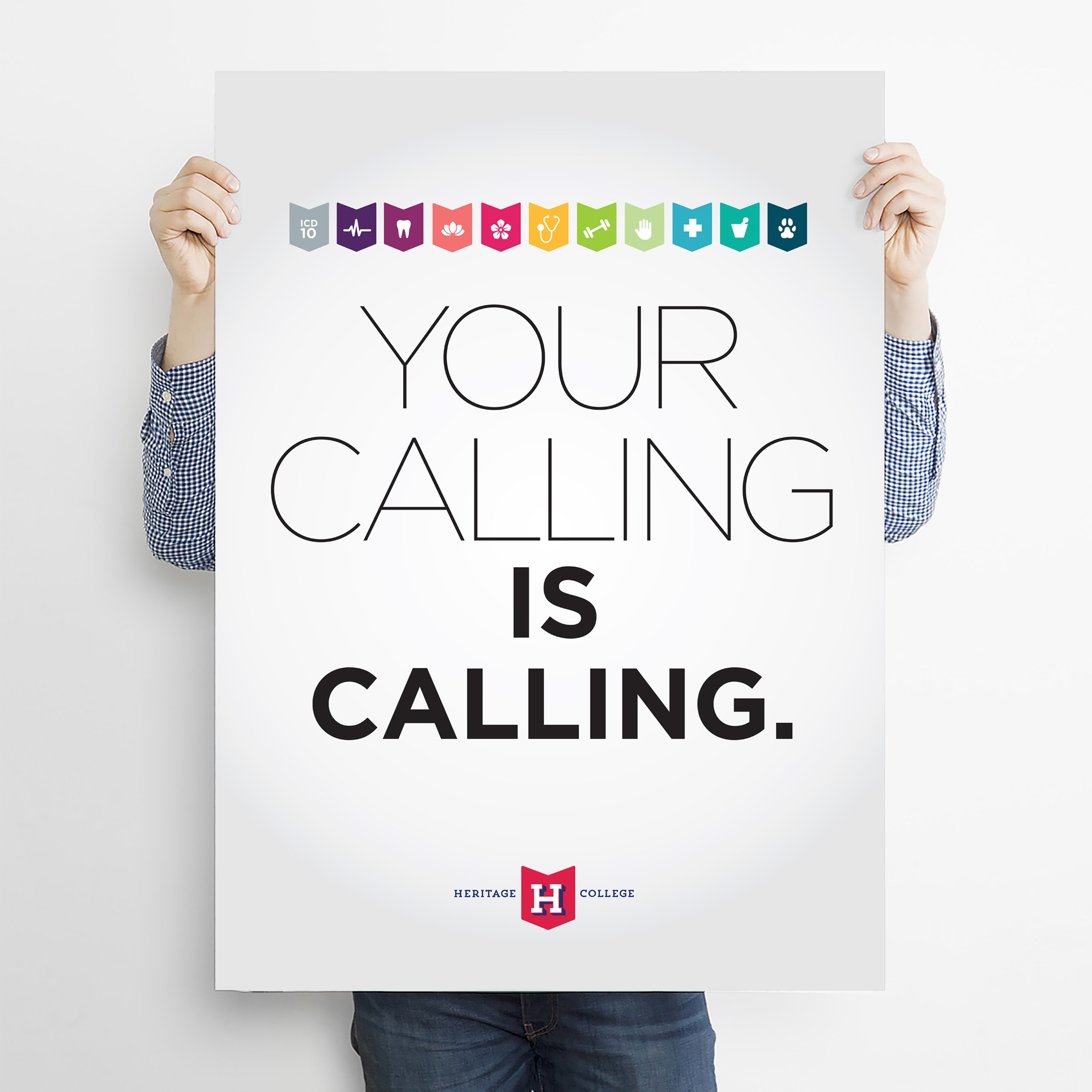 Person holding a large sign that says 'Your calling is calling' with colorful icons of healthcare and education at the top and a Heritage College logo at the bottom.