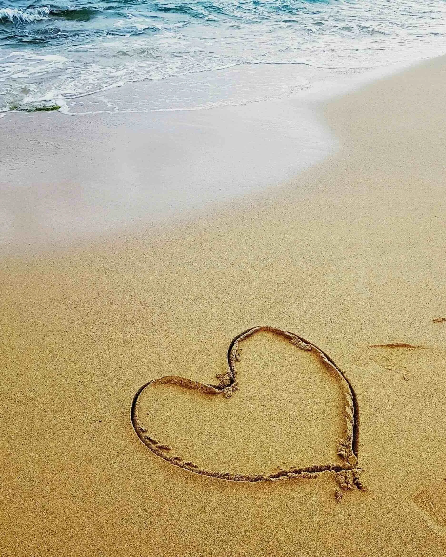 Emotive heart on beach