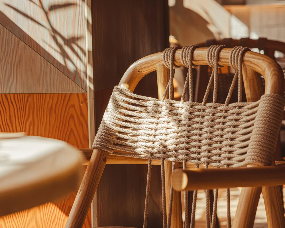 Woven chair in sunlight