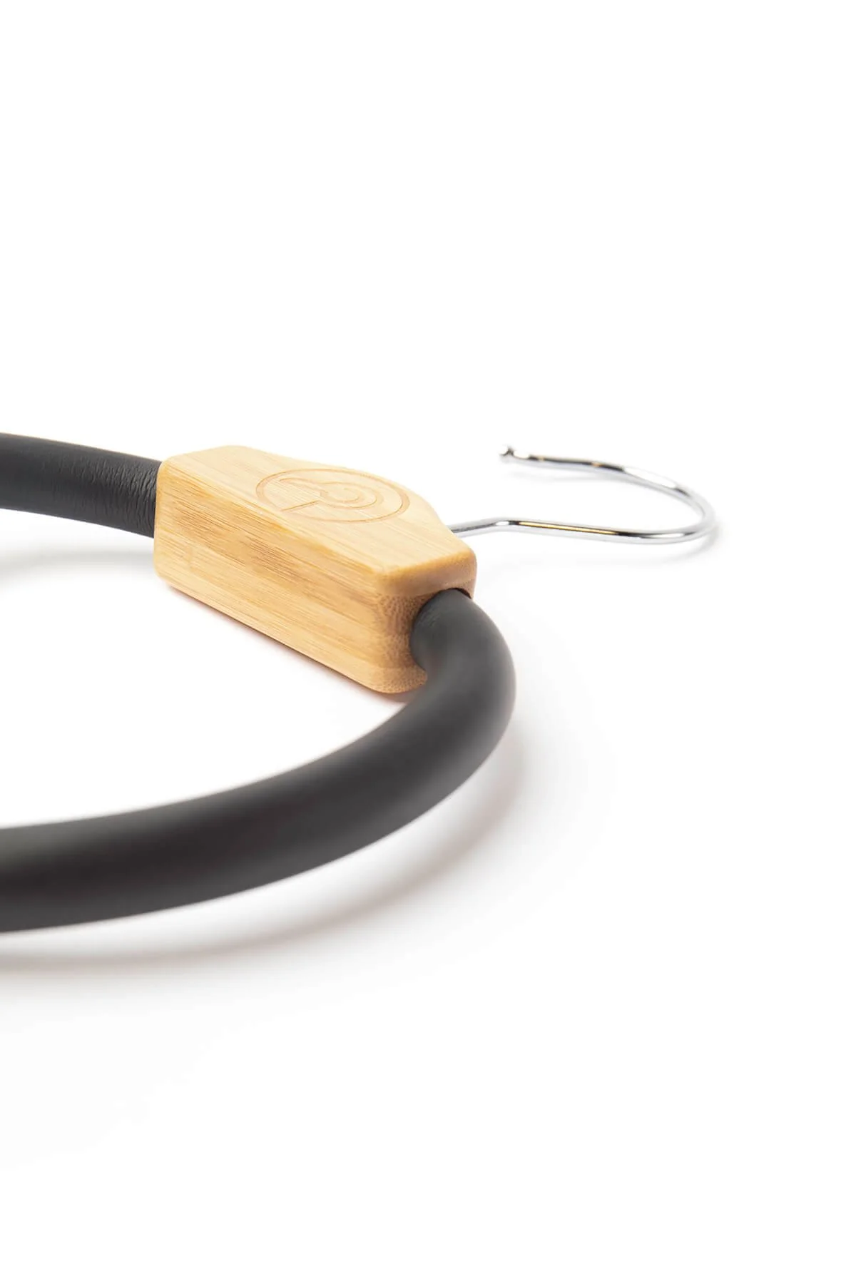 Close-up of a black cycling lock with a bamboo detailed lock component and metal hook on a white background.