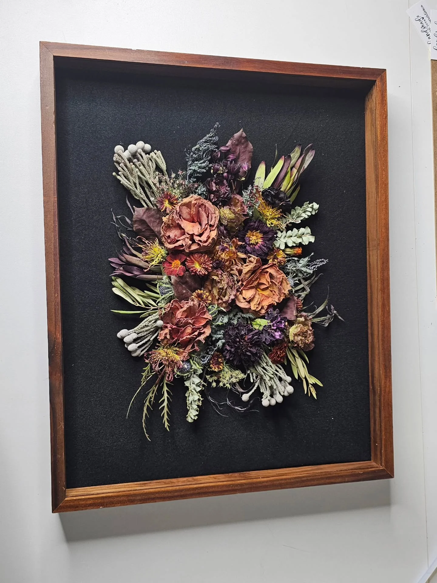 I absolutely love how this shadow box turned out! 
16x20 Black with Wood

The contrast of the black background gives it a nice fall vibe. 
#floralart #bouquetart #bouquetpreservation #coloradowedding