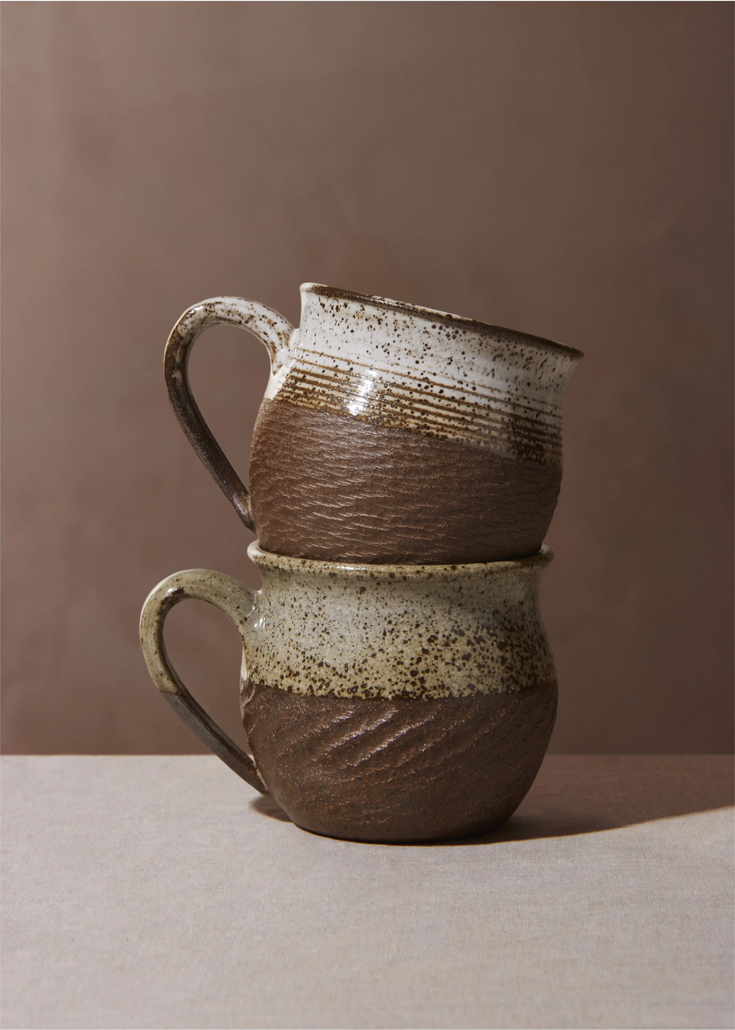 Woodfired mugs handmade by Marnie Waghorn in Sheffield and fired in a wood kiln in the Peak District.