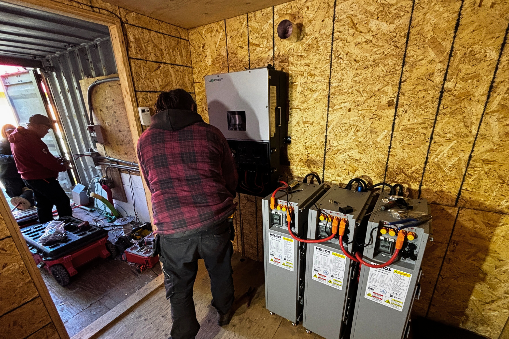 Our licensed electrician connected the inverter generator and battery system together. 
Transitioning from lead-acid to lithium storage will reduce generator run-time by 50%. This will result in fuel savings and maintenance on the generator.  