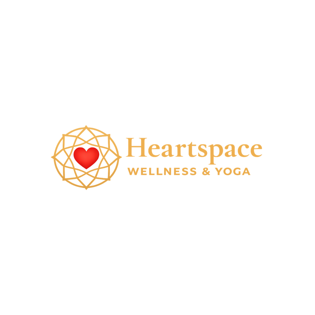 Logo for Heartspace Wellness & Yoga featuring a red heart within a geometric golden shape on a white background.