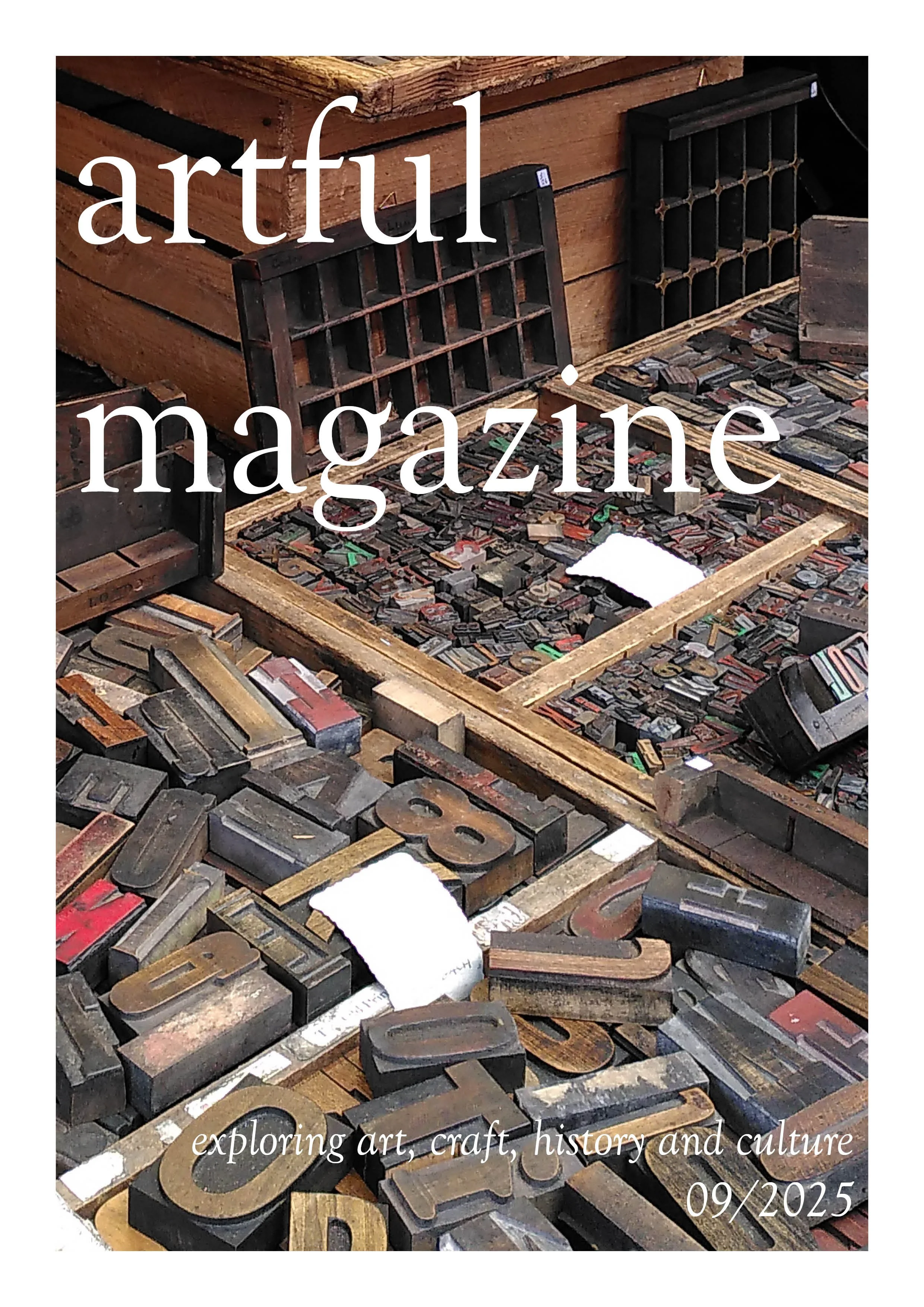Close-up of vintage letterpress and printing blocks with the text 'artful magazine' overlaid. The background consists of wooden printing presses and scattered metal and wood type characters, with an emphasis on historical printing craftsmanship.