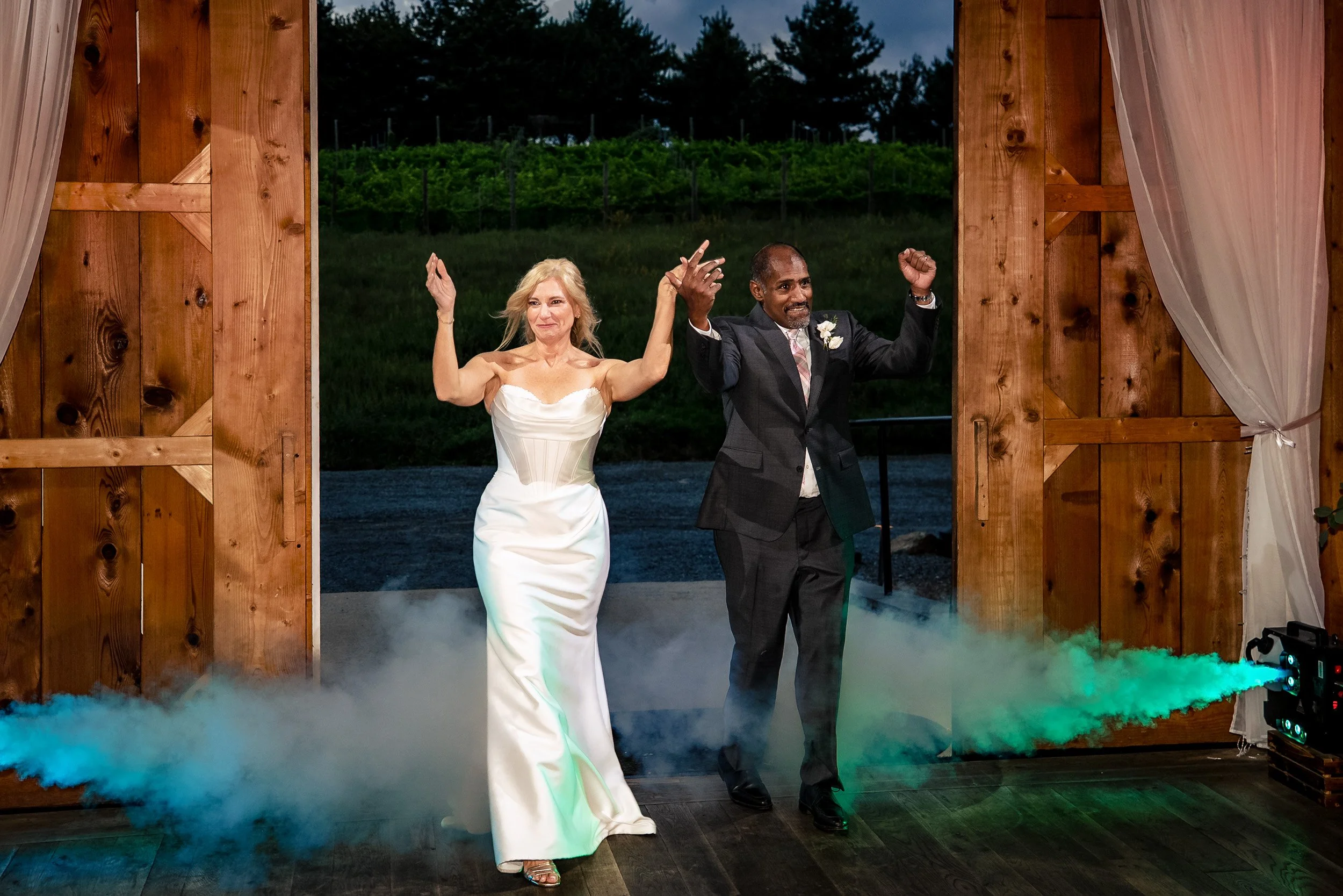 bride and groom entering reception