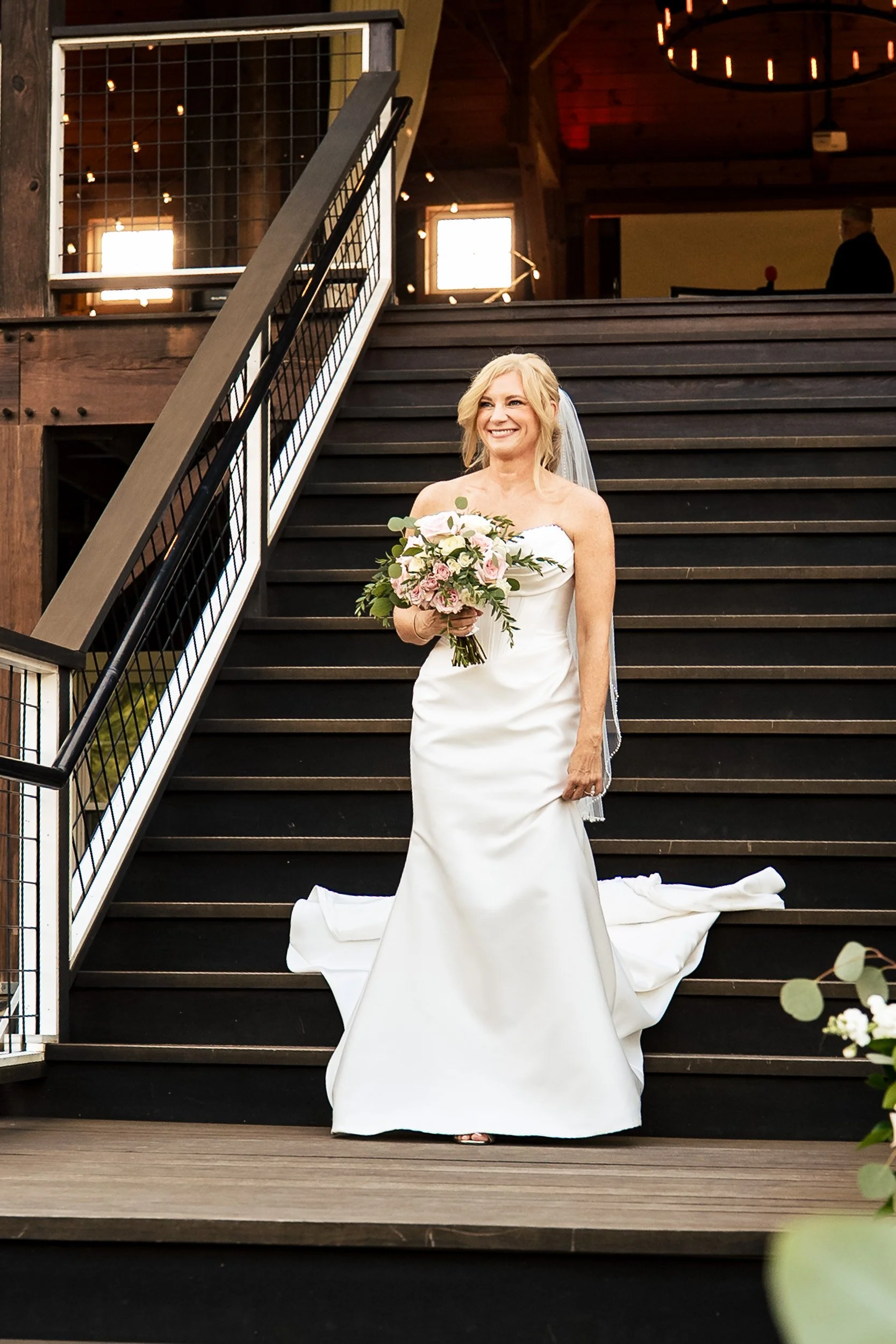 bride coming down staircase