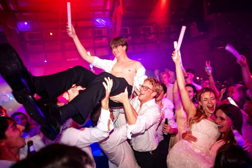 Guests celebrating on a packed dance floor at a Manassas, Virginia wedding.`