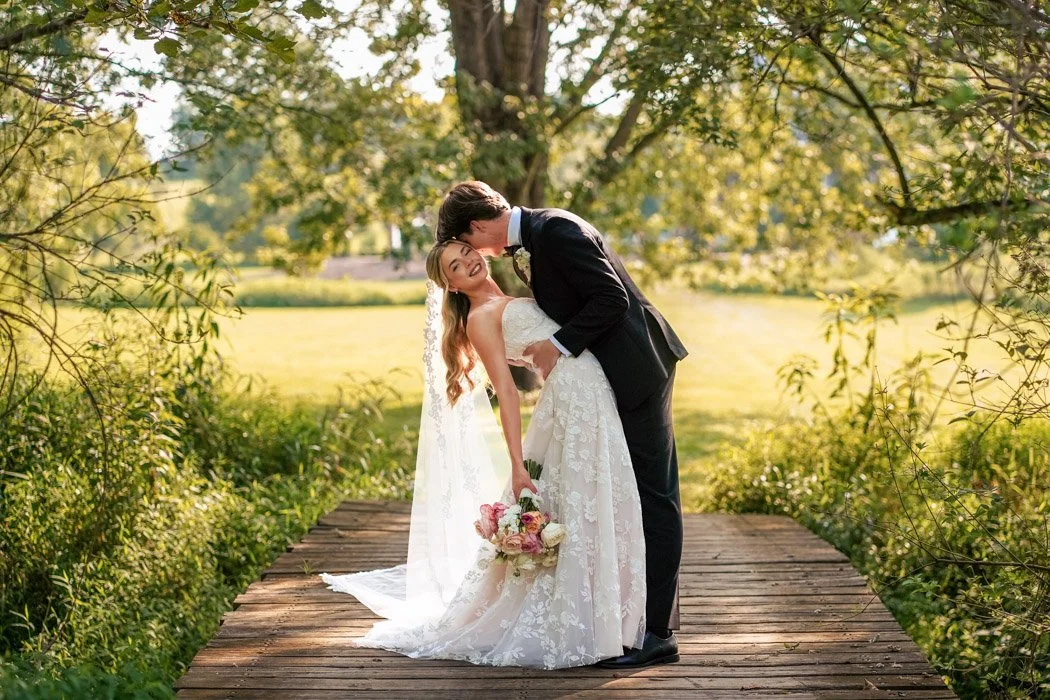 Fiona and Cole sharing a romantic moment during their Manassas wedding portraits.`