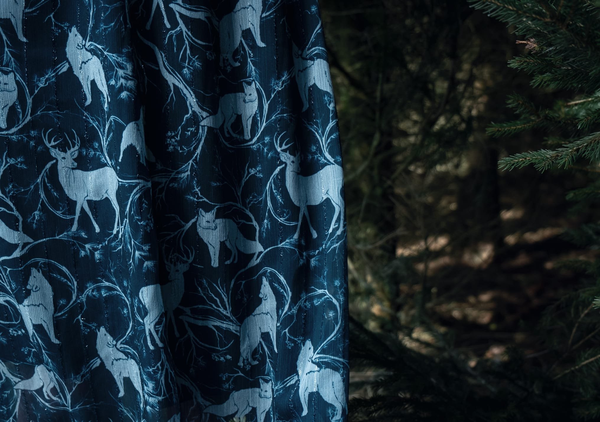 Close-up fabric with animals and branches
