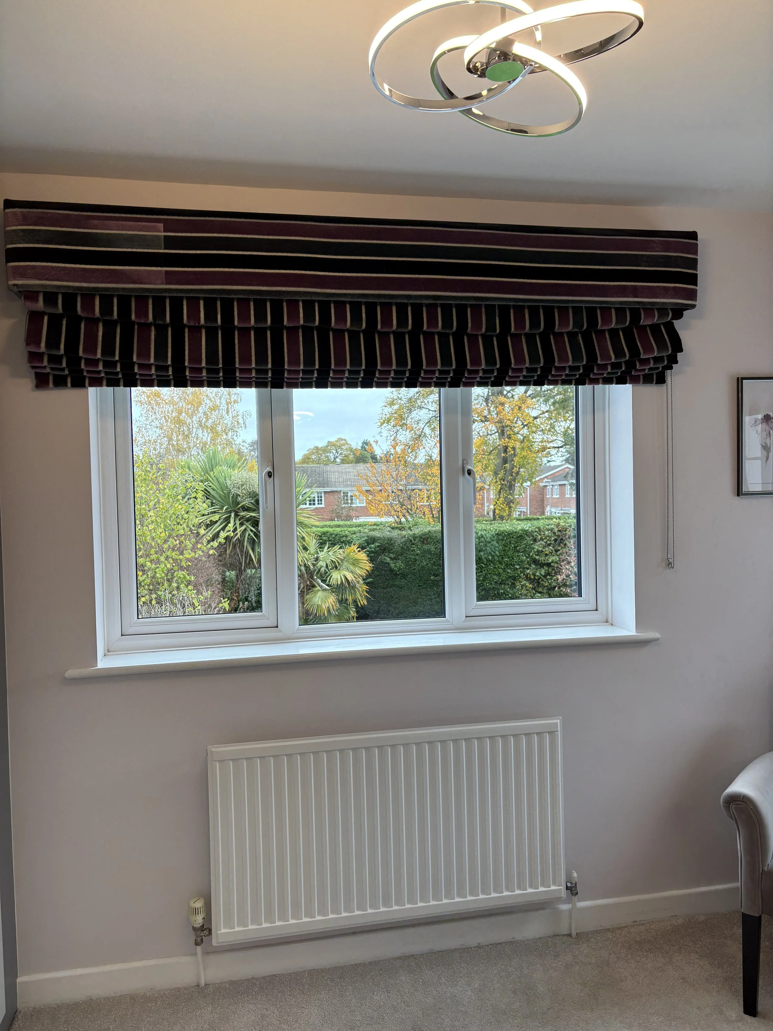 Before: bedroom with dated window treatments and lack of cohesive design scheme, Nottinghamshire