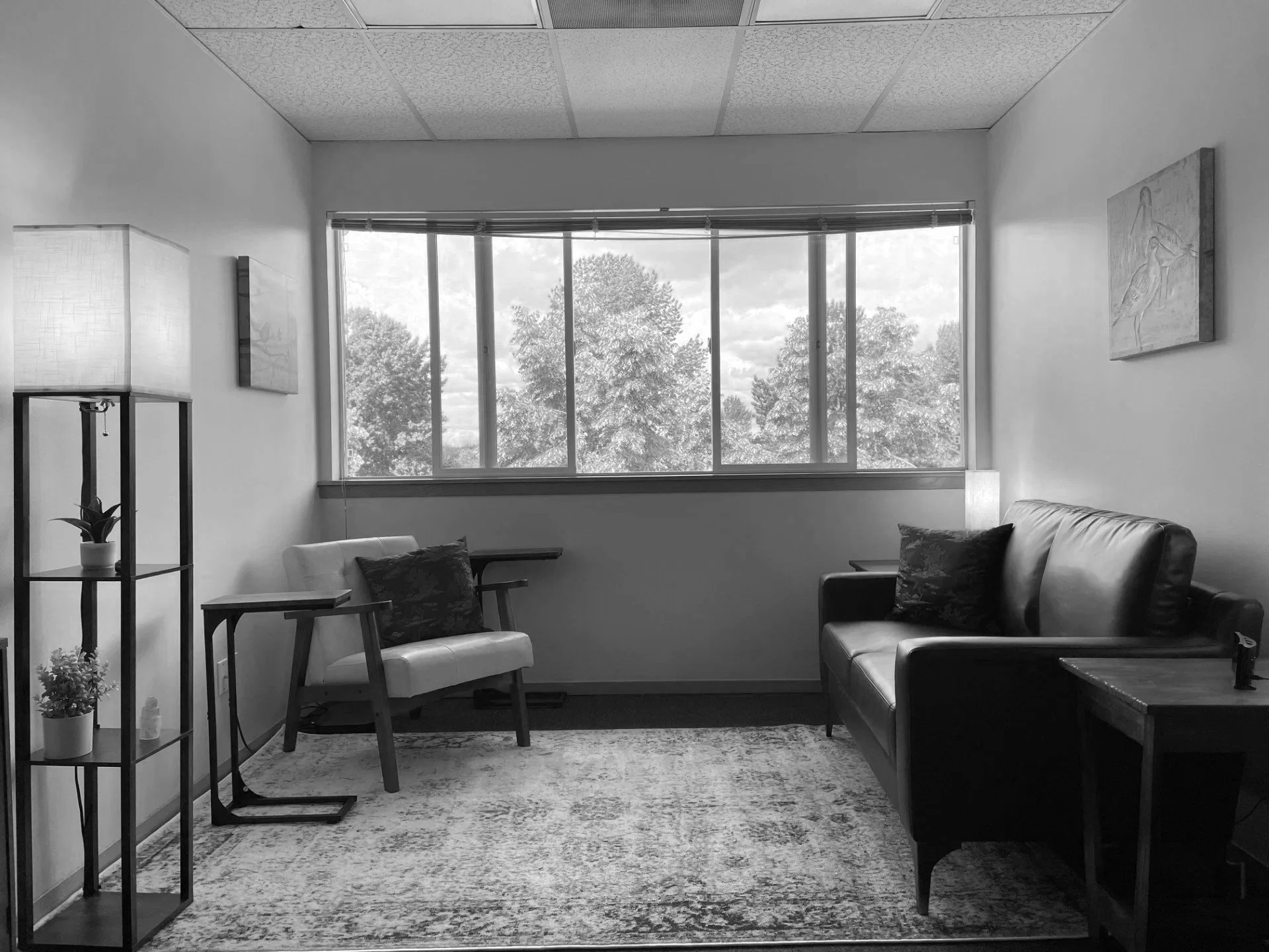A comfortable, sensory-conscious consultation room at Peace Humanistic Therapy, featuring soft seating and a calming atmosphere for neurodiversity-affirming care.