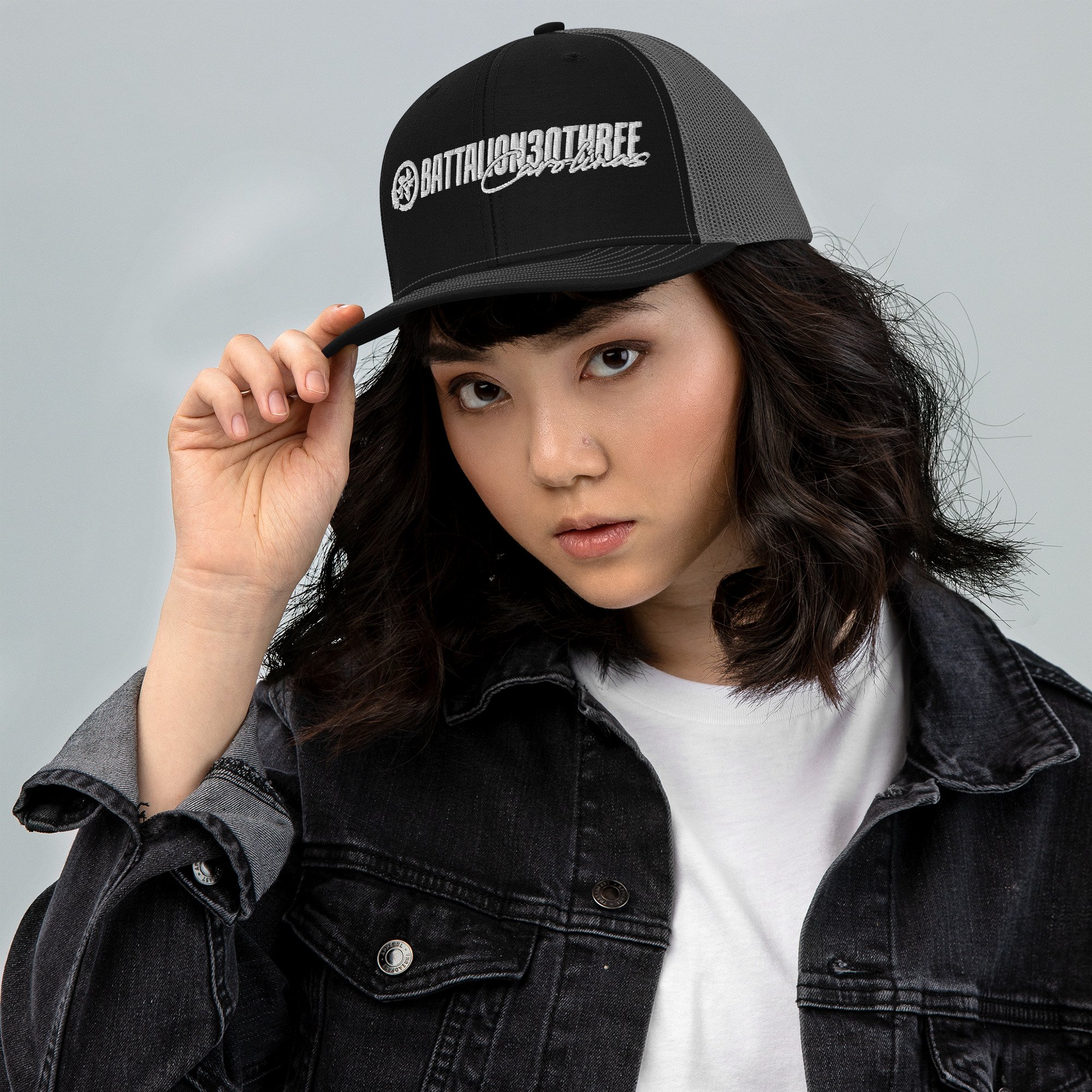 snapback-trucker-cap-black-charcoal-front-686e86040afb2.jpg