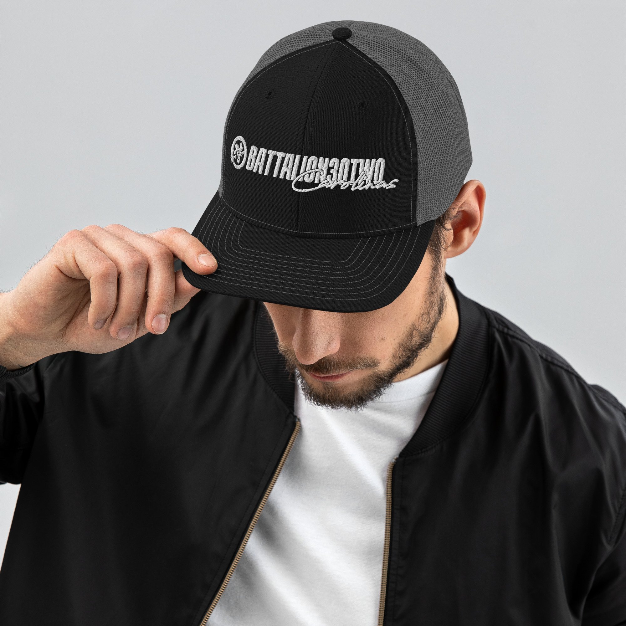 snapback-trucker-cap-black-charcoal-front-686e86badc023.jpg