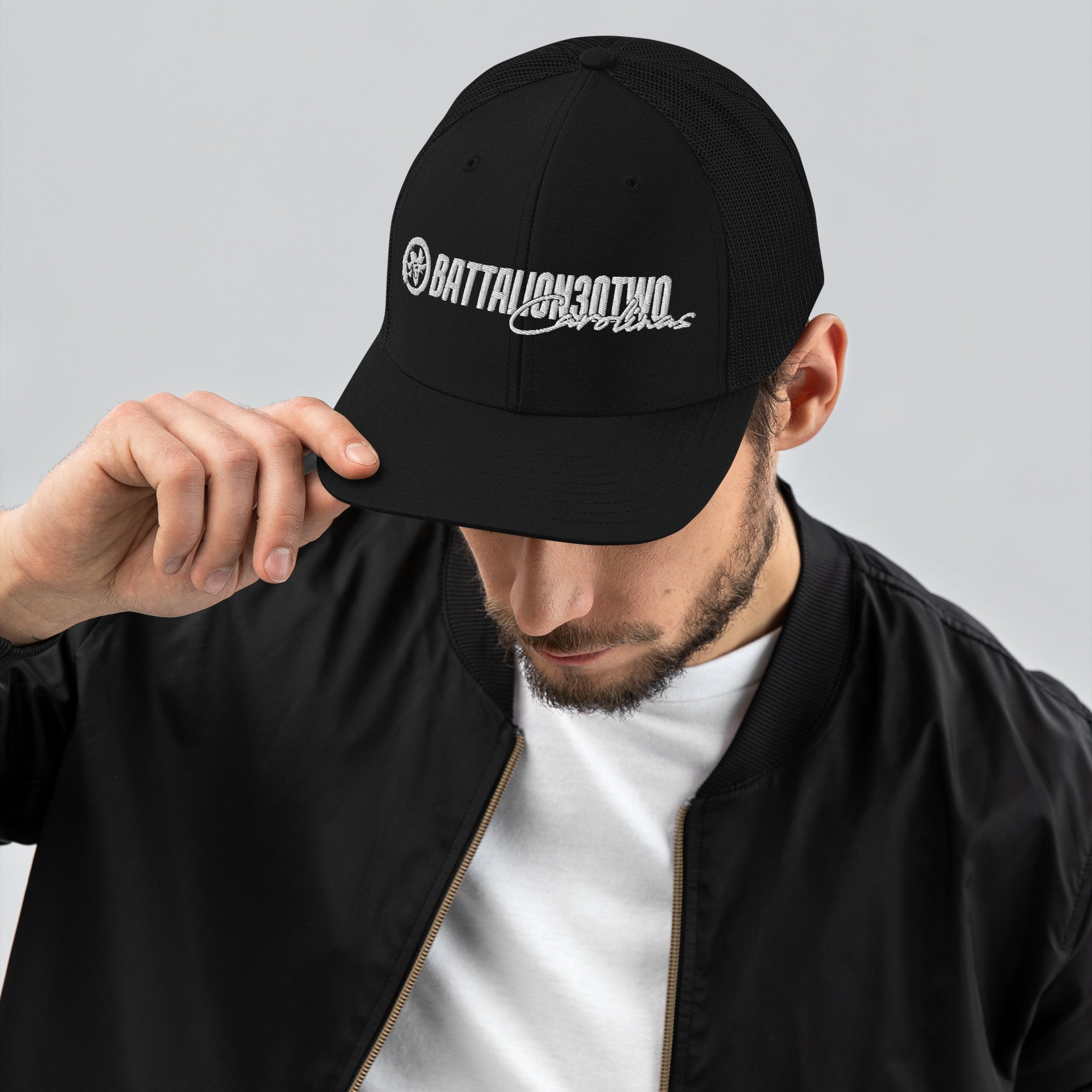 snapback-trucker-cap-black-front-686e86badcd7d.jpg