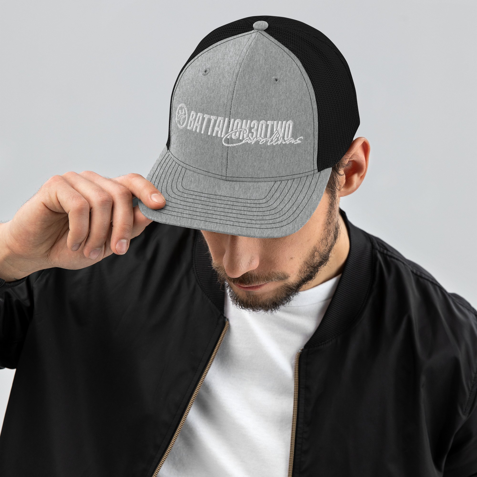 snapback-trucker-cap-heather-grey-black-front-686e86badd918.jpg