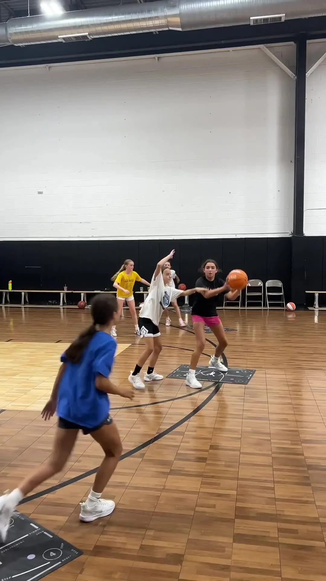 At Next Play we emphasize the importance of working in 3v3 scenarios. Here we had the paramus girls work on playing out of a post up at the top of the key.