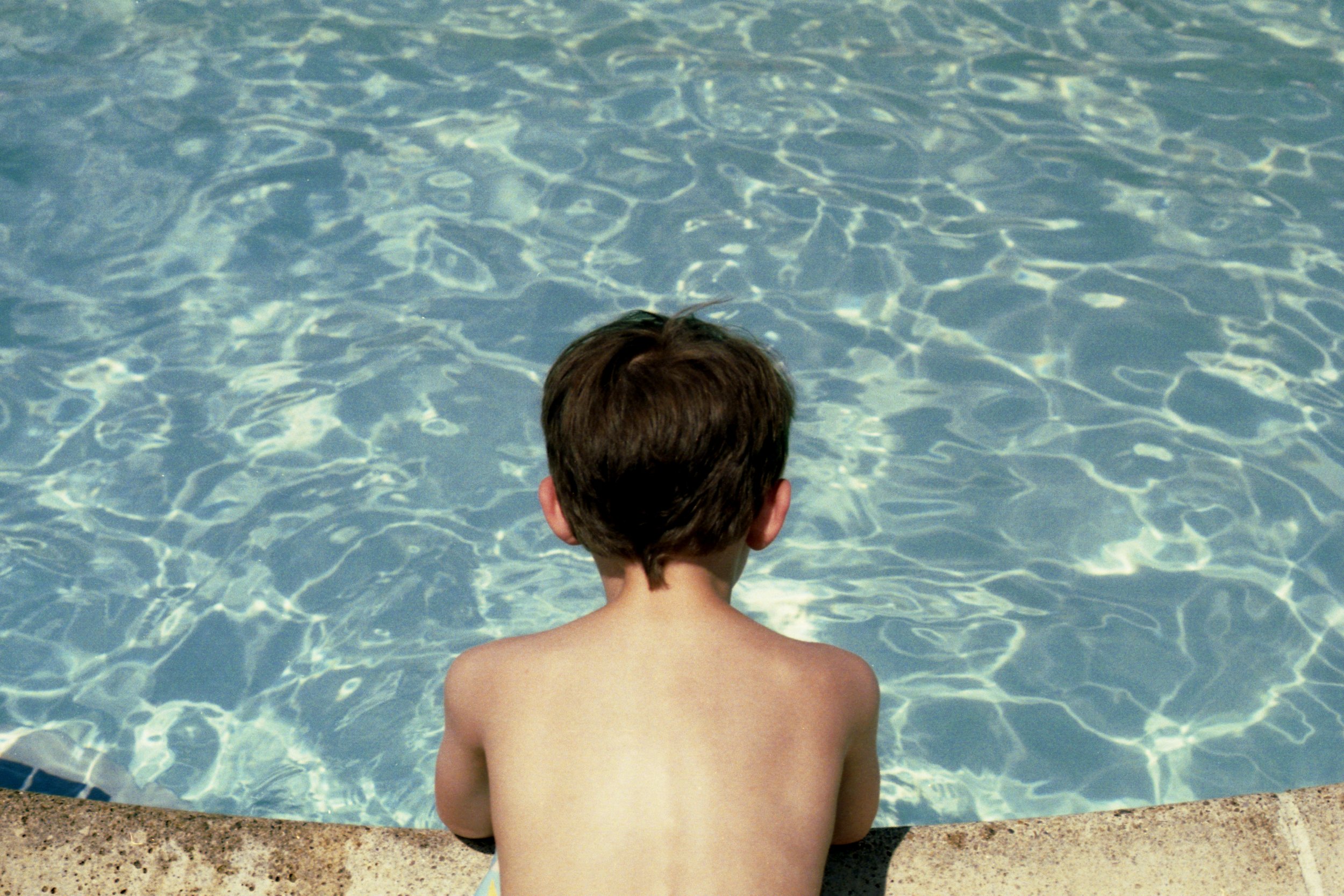 Finley Gazing into the Pool More Blue.jpg