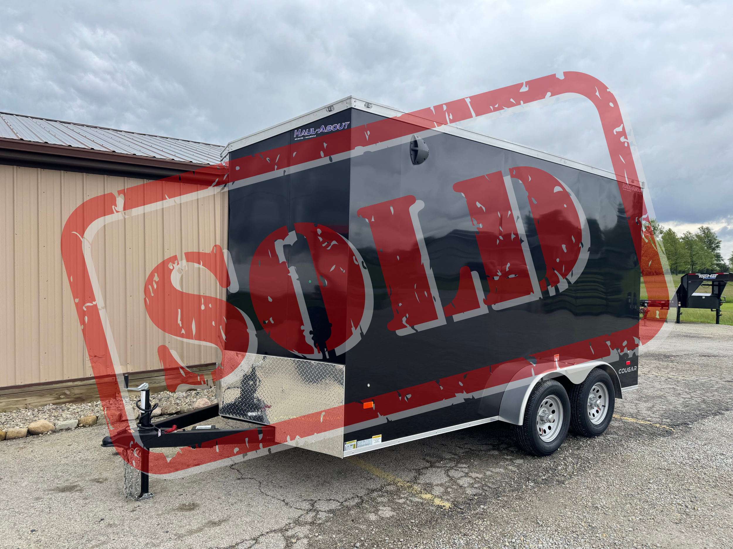 SOLD Haul About 7’x14’ Cougar.png