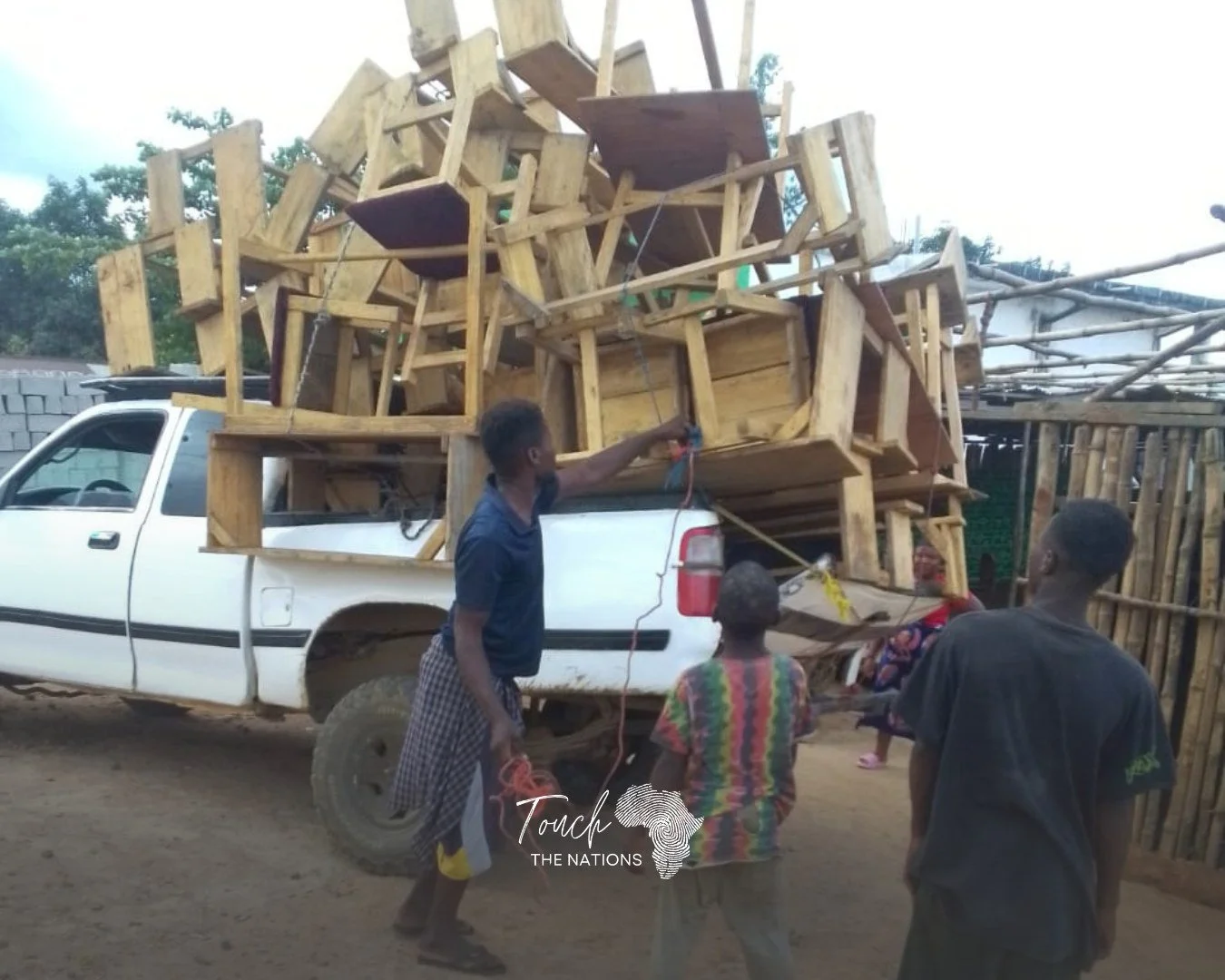 A small upgrade can make a big difference.

This newly built classroom furniture is headed to the school in Liberia. Teachers will enjoy cushioned chairs while they prepare lessons to invest in the next generation. Students will have quality benches 
