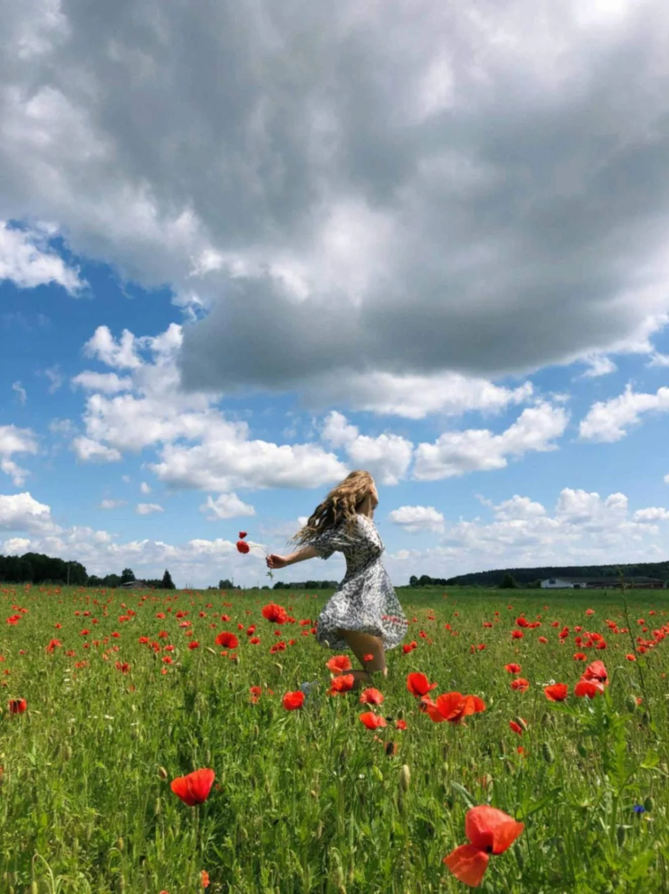 Teen girl running through a bright flower field under a blue sky, symbolizing freedom, confidence, and emotional healing through Christian teen counseling for anxiety and identity struggles in Texas.