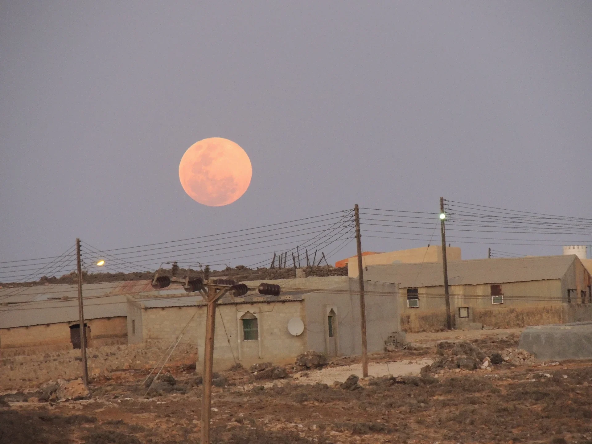 moon-over-village.webp