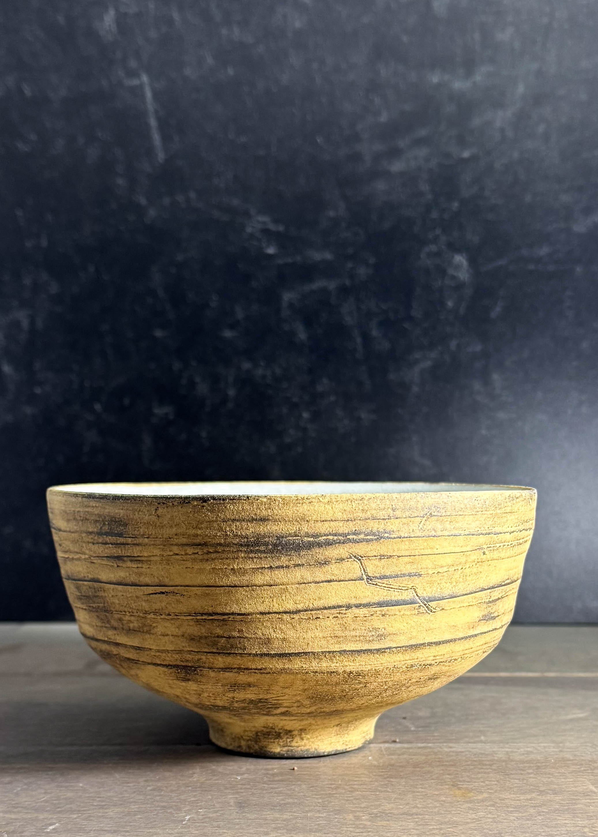Weathered_Spiral_Yellow_Bowl-1.jpg