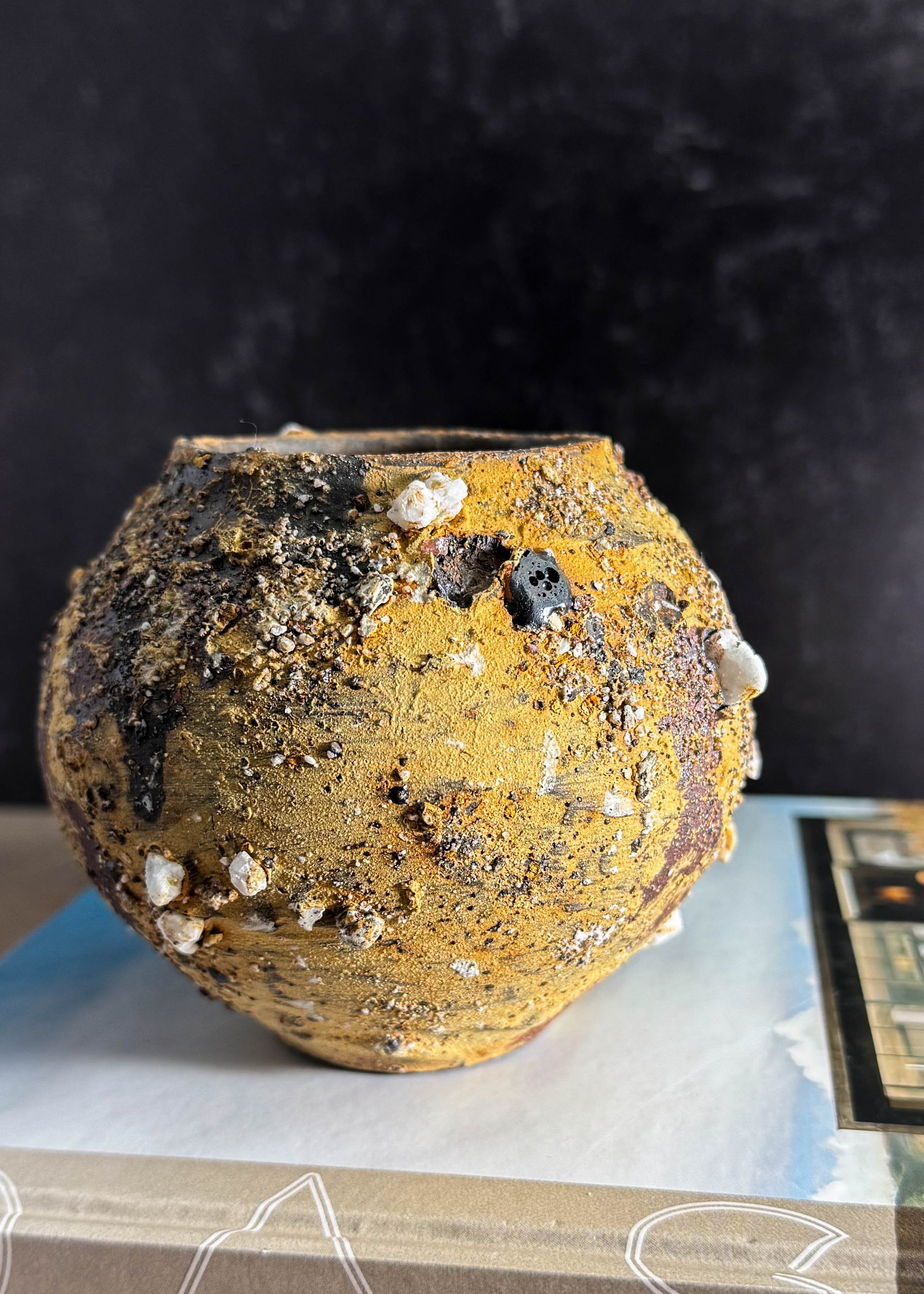 2025, 4h x 4.5w, thrown, wild slip, underglaze, aggregates, lava ash