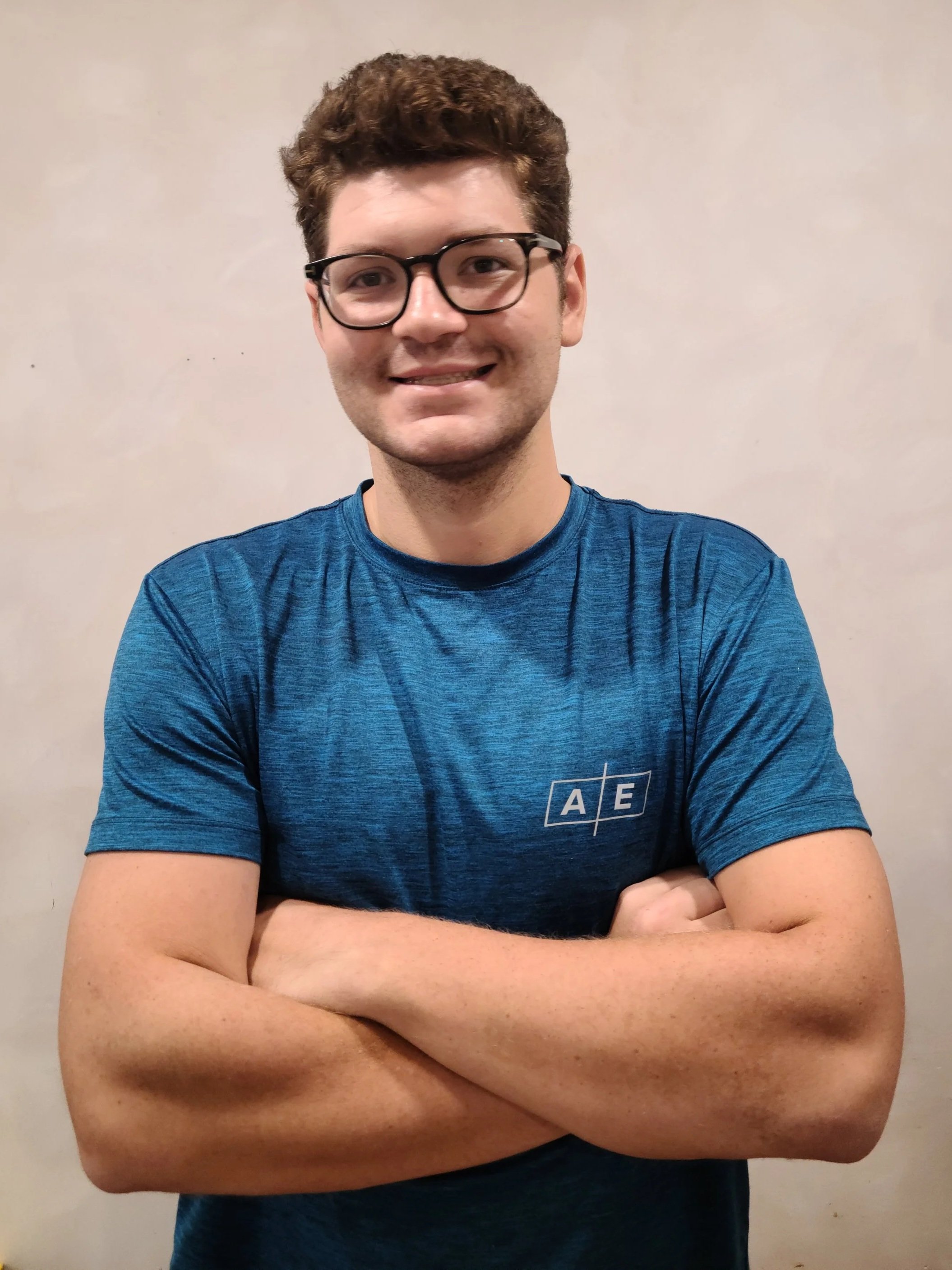 Red circle with a white lowercase letter 'h' in a cursive font.