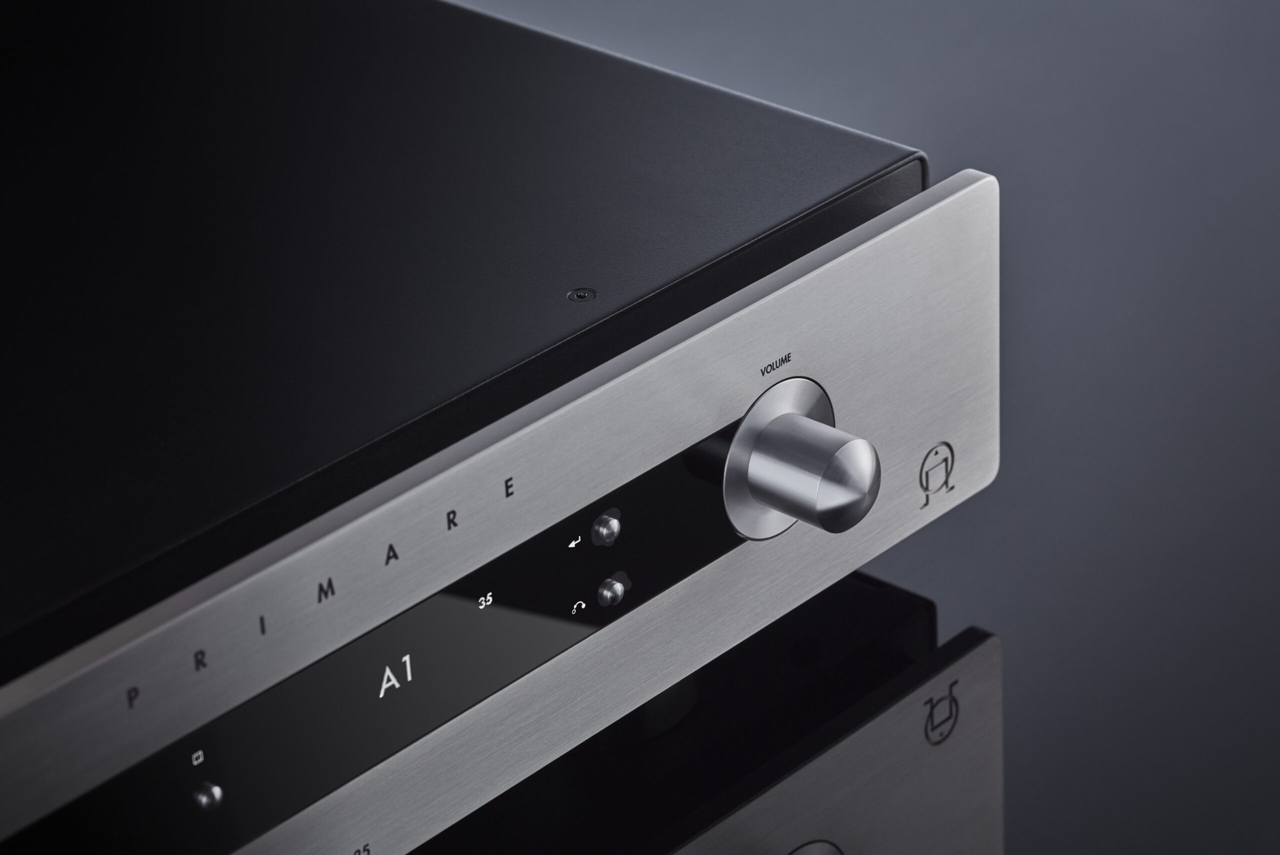 primare-i35-modular-integrated-amplifier-side-titanium-close-up-volume-scaled-1.jpg