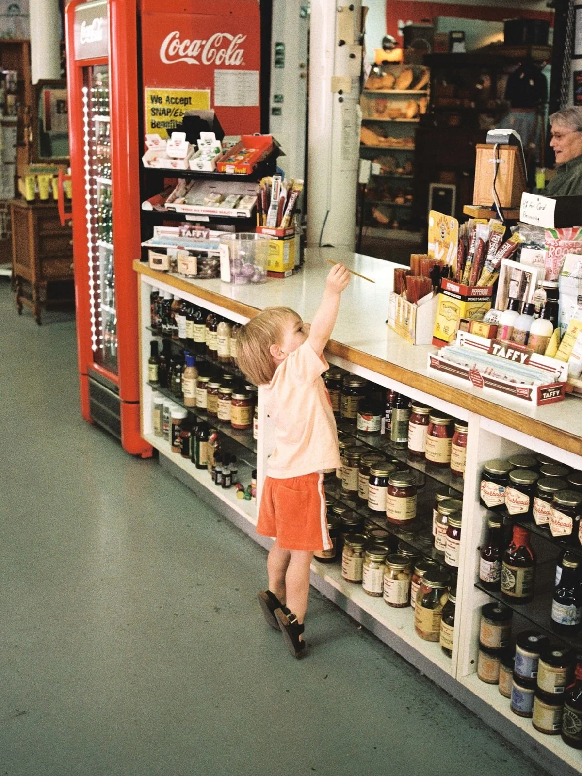 kid reaching over counter.jpg