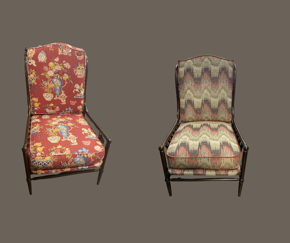 Two vintage upholstered chairs with dark wood frames, one with floral red fabric and the other with geometric patterned fabric