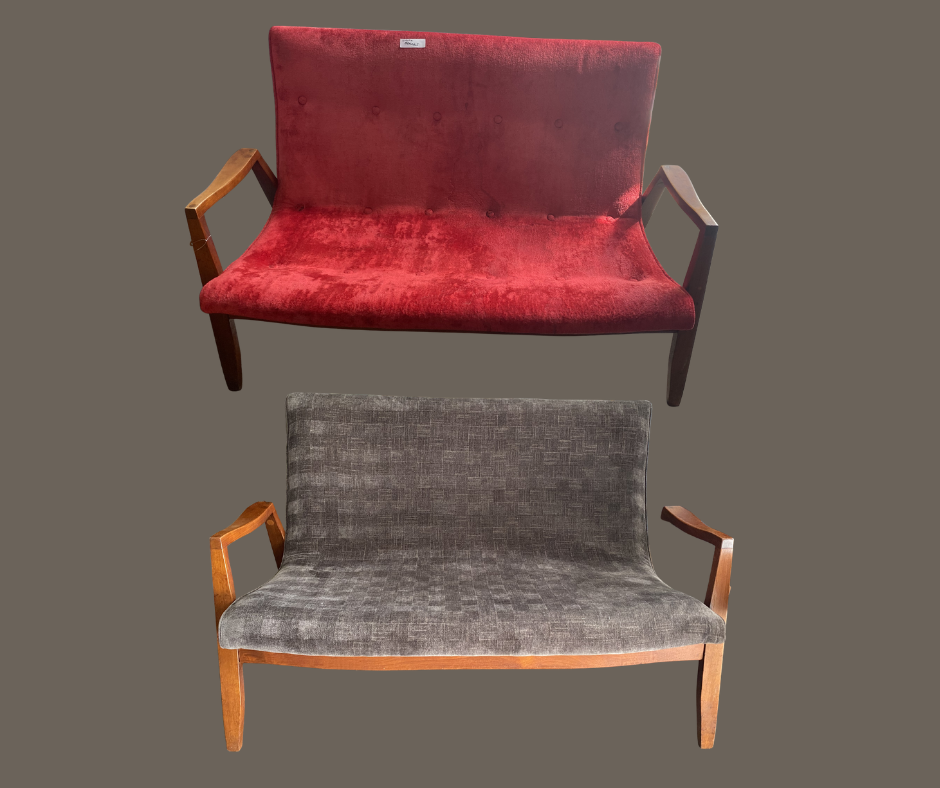 Two vintage style wooden sofas, one with red velvet upholstery and the other with gray fabric upholstery, placed against a plain background.