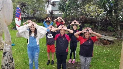 Ākonga displaying actions from a waiata. Image: LEARNZ.